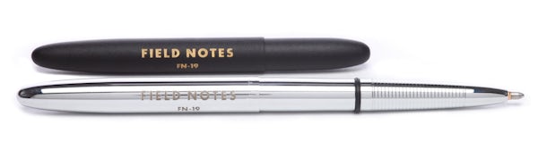 Black Fisher space pen (collapsed) and chrome Fisher space pen (expanded) side by side.