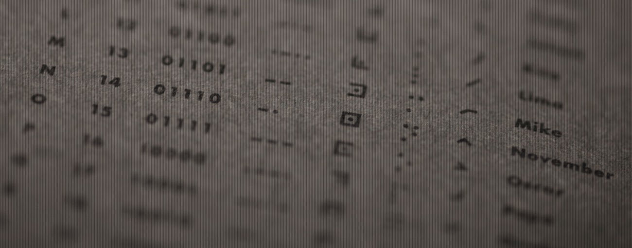 Close up of codes on the back cover of the Clandestine Edition black  notebook