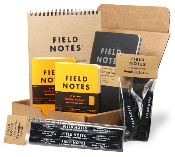 Field Notes Project Kit includes 1 brown Steno Pad, 1 larger sized Pitch Black 2-Pack, 2 Utility Ledger 3-Packs, 1 black Carpenter Pencil 3-Pack, and a 12-Pack of black rubber bands.