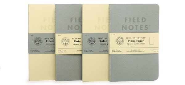 Row of 4 Signature Series cream color ruled paper 2-Packs and gray plain paper 2-Packs