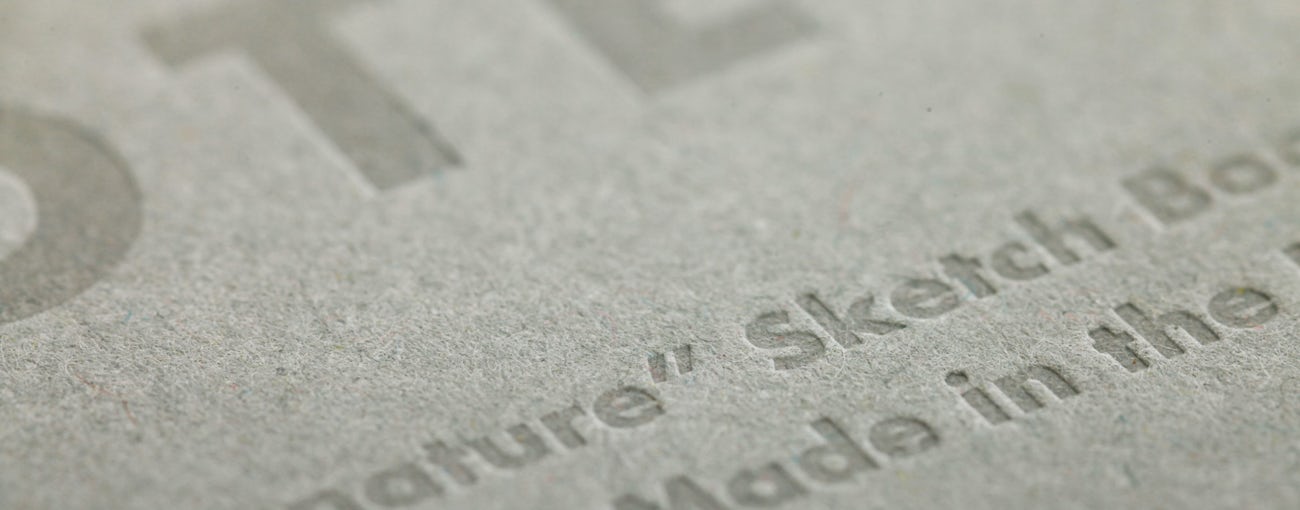 Inside cover close-up of the Signature notebook in grey.